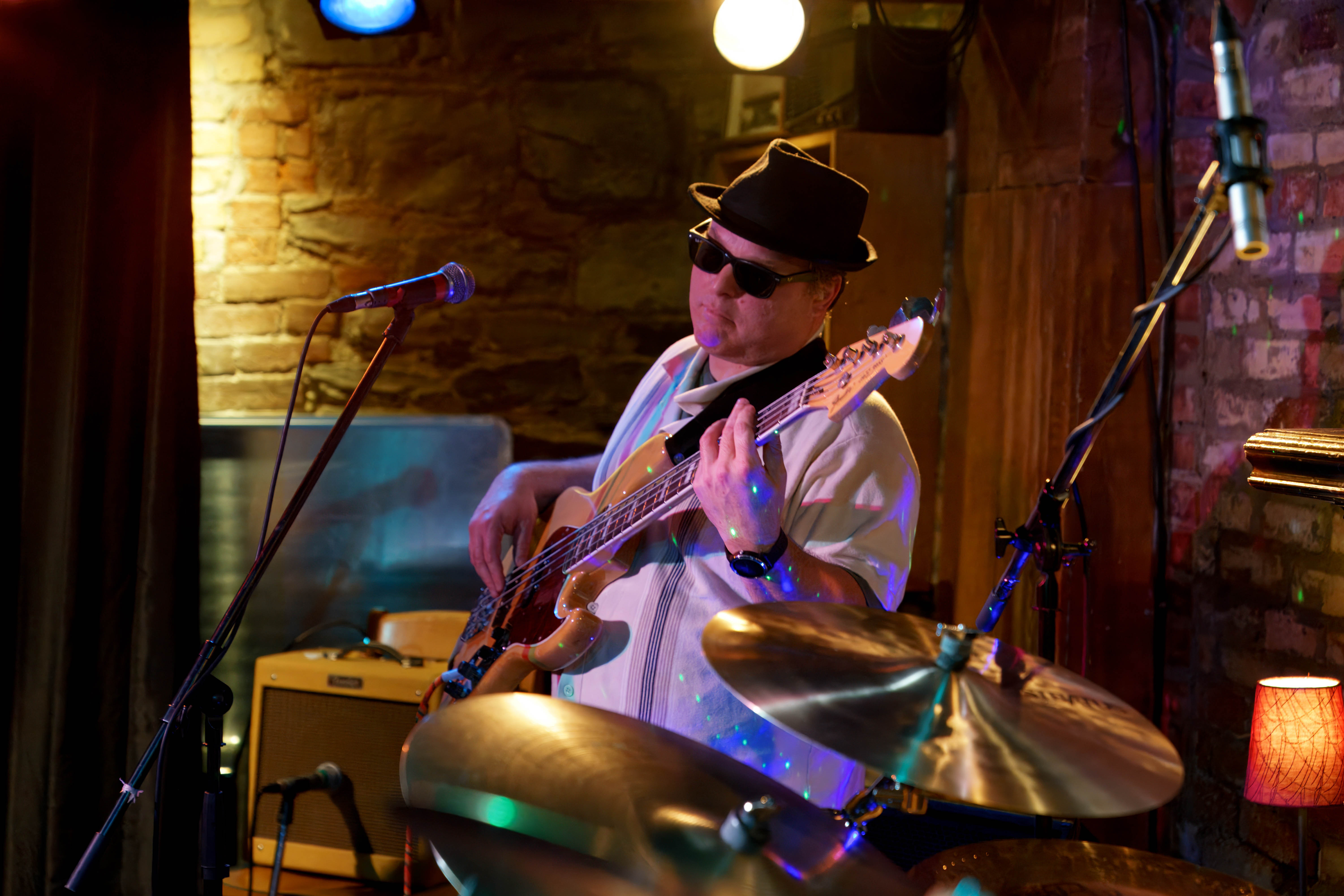 Mike playing bass guitar